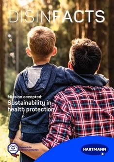 Cover of a magazin showing a father and son hugging from the back