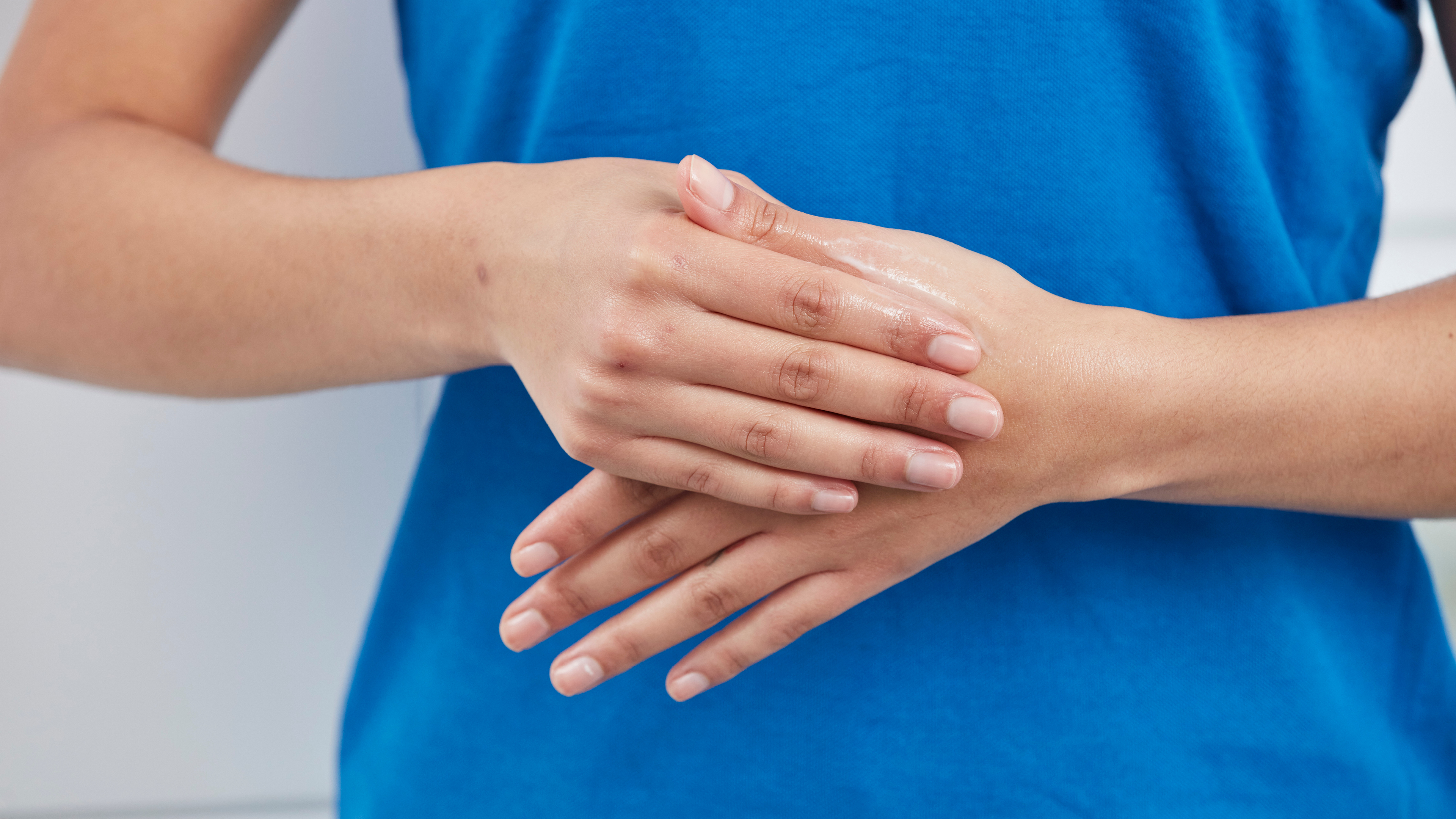 Two hands rubbing in hand disinfection