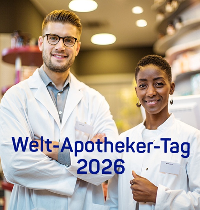Two pharmacists in white coats stand smiling in a pharmacy with the text World Pharmacists Day 2026 displayed across the image.