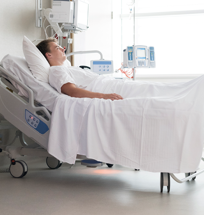 Patient lying in hospital room